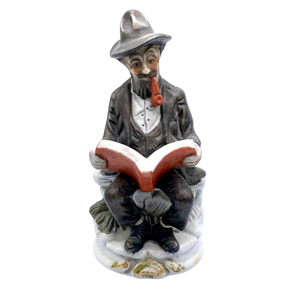 Vintage Bisque Figurine Of Old Man With Pipe Hat Reading Book Sitting on Bench